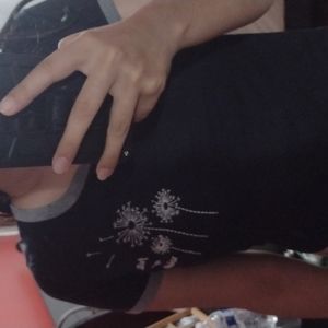 Black crop top with small lettering